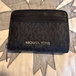 Michael Kors Black Textured Wallet New with out tag. Never used